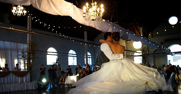 A couple dancing at their wedding at the fairgrounds