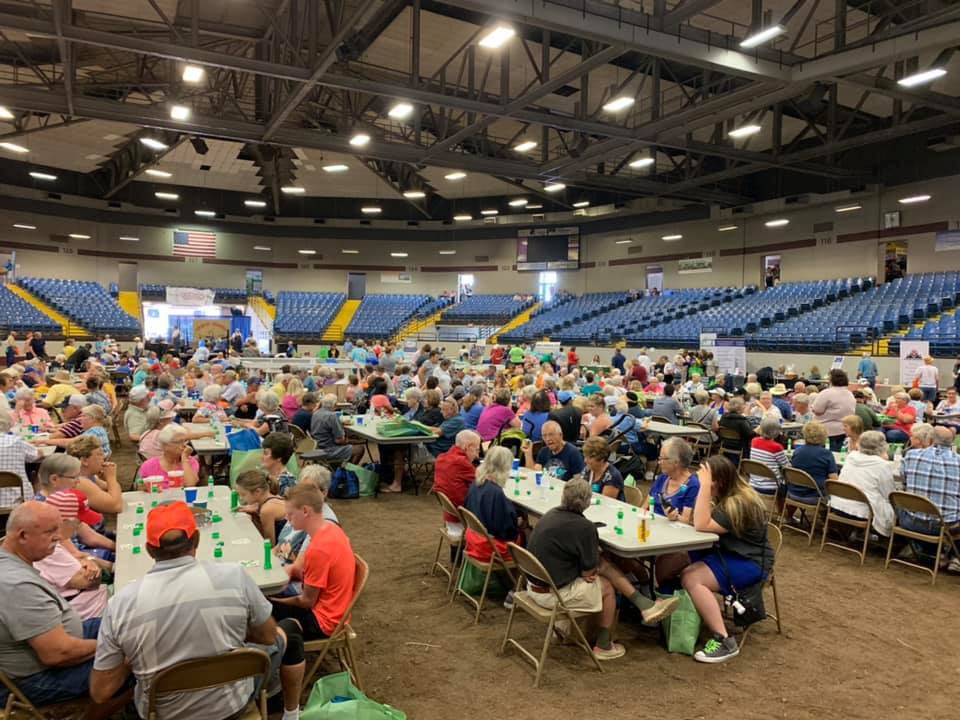 Long folding tables filled with people playing bingo