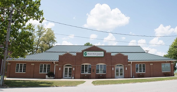 An exterior view of the front of the red brick Missouri Electric Cooperatives building
