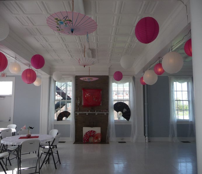 The inside of the Womans Building set up for a party
